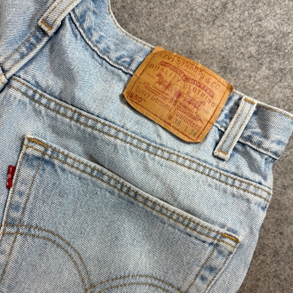 Vintage Levis 550 Relaxed Fit Light Wash Denim Jeans Made in USA 38x34 Cowboy